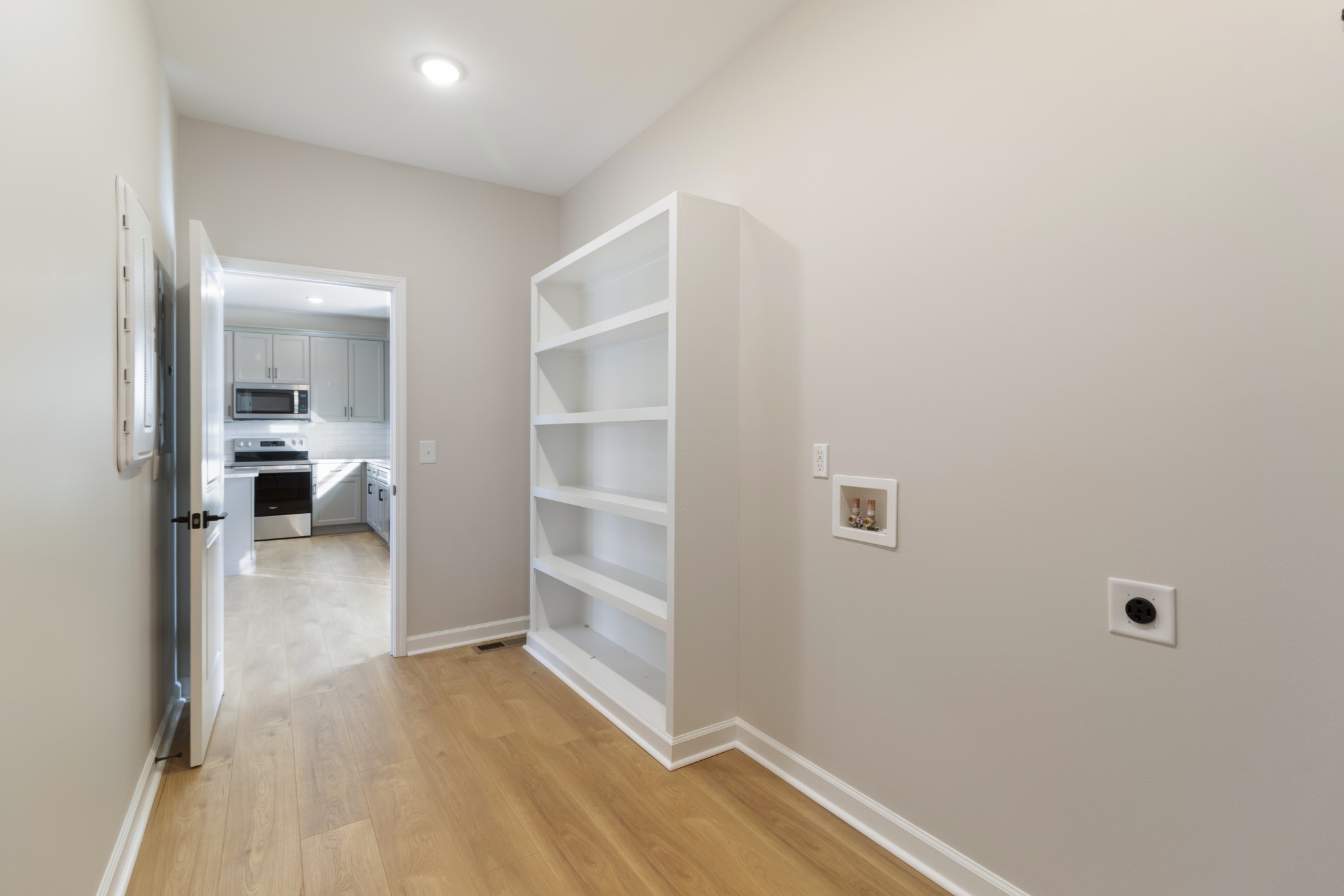 6170 Rocky Mound Road Westmoreland, TN 37186 - Photo 13 of 24 a view of a hallway with wooden floor and closet