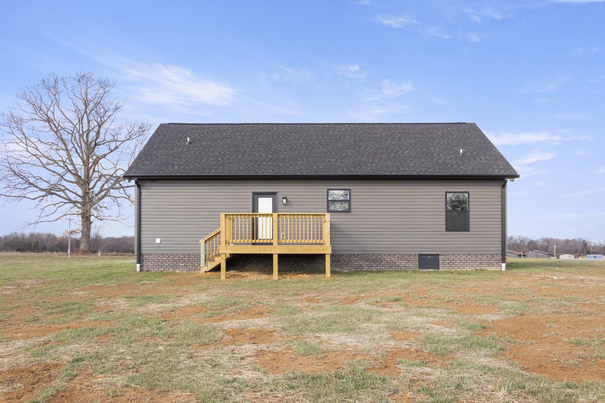 6170 Rocky Mound Road Westmoreland, TN 37186 - Photo 2 of 24 a front view of a house with a yard