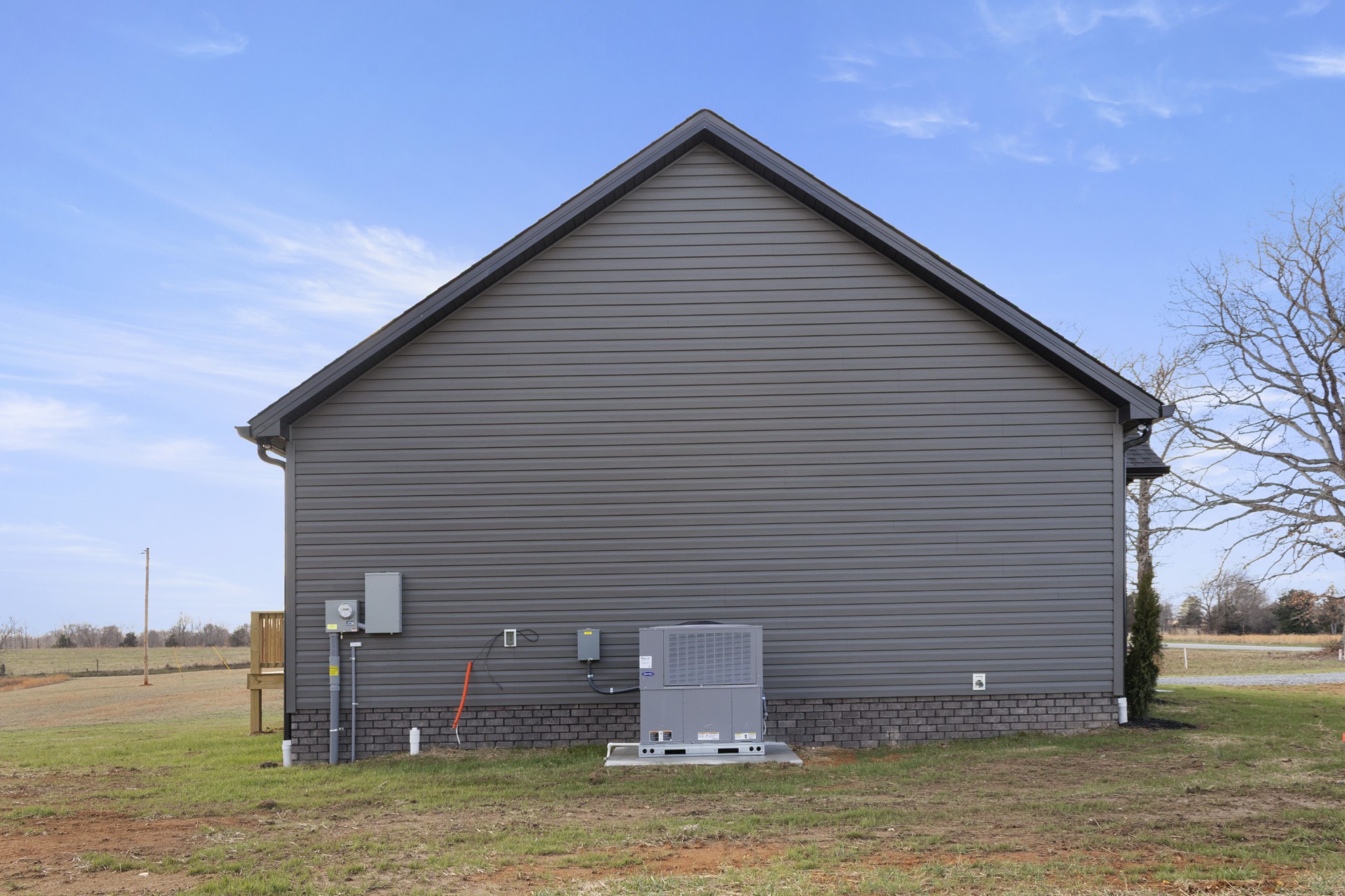 6170 Rocky Mound Road Westmoreland, TN 37186 - Photo 4 of 24 a view of a house with a yard