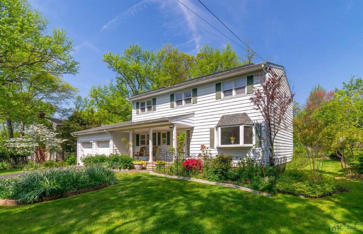 4 Devon Road Edison, NJ 08820 - Photo 2 of 35 a view of a house with a yard and potted plants