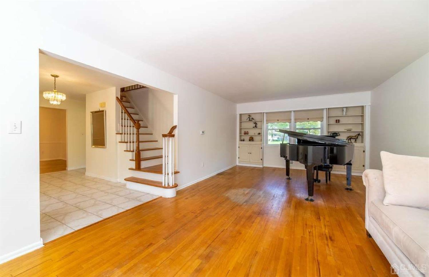 4 Devon Road Edison, NJ 08820 - Photo 8 of 35 a living room with furniture and wooden floor