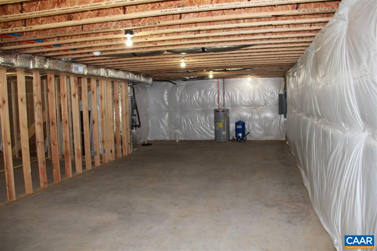 131 Farm Ridge Drive Ruckersville, VA 22968 - Photo 30 of 32 a view of room with wooden walls