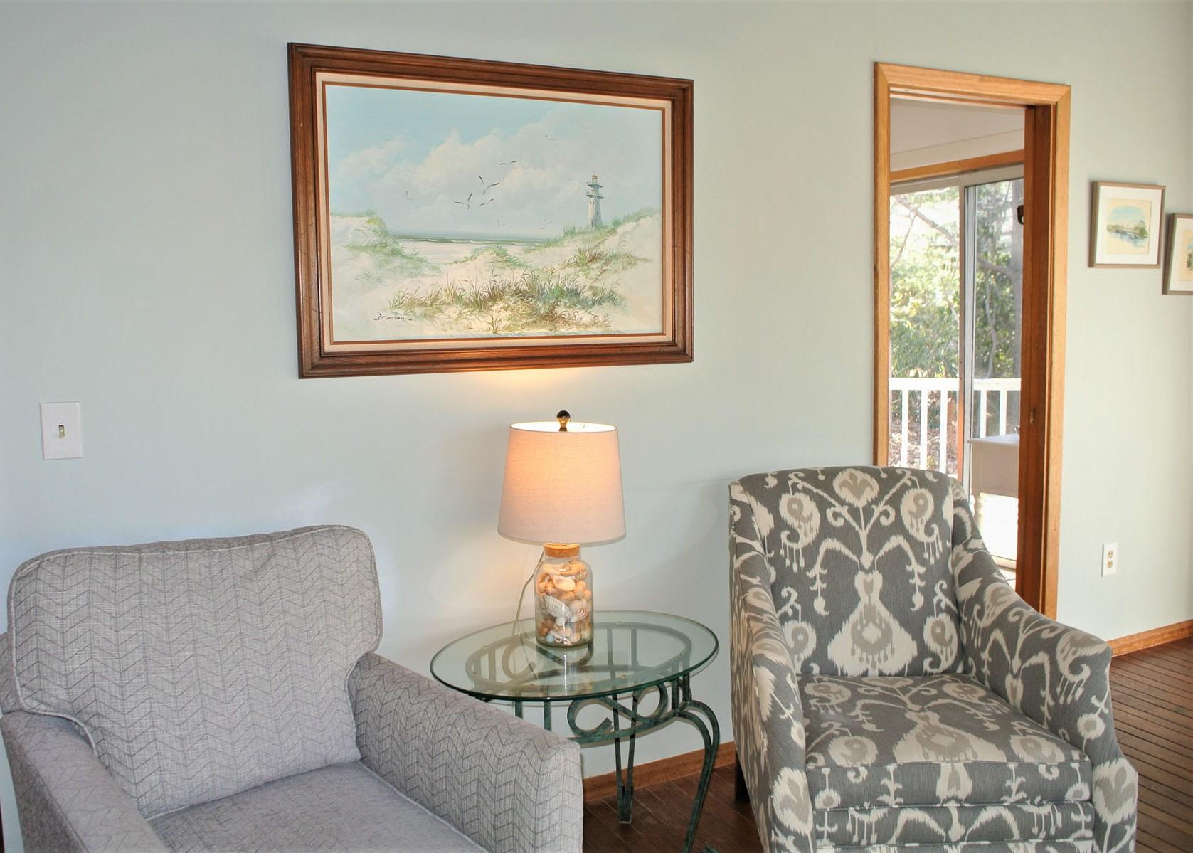 163 Greensward Road Mashpee, MA 02649 - Photo 11 of 37 a living room with furniture a lamp and a window