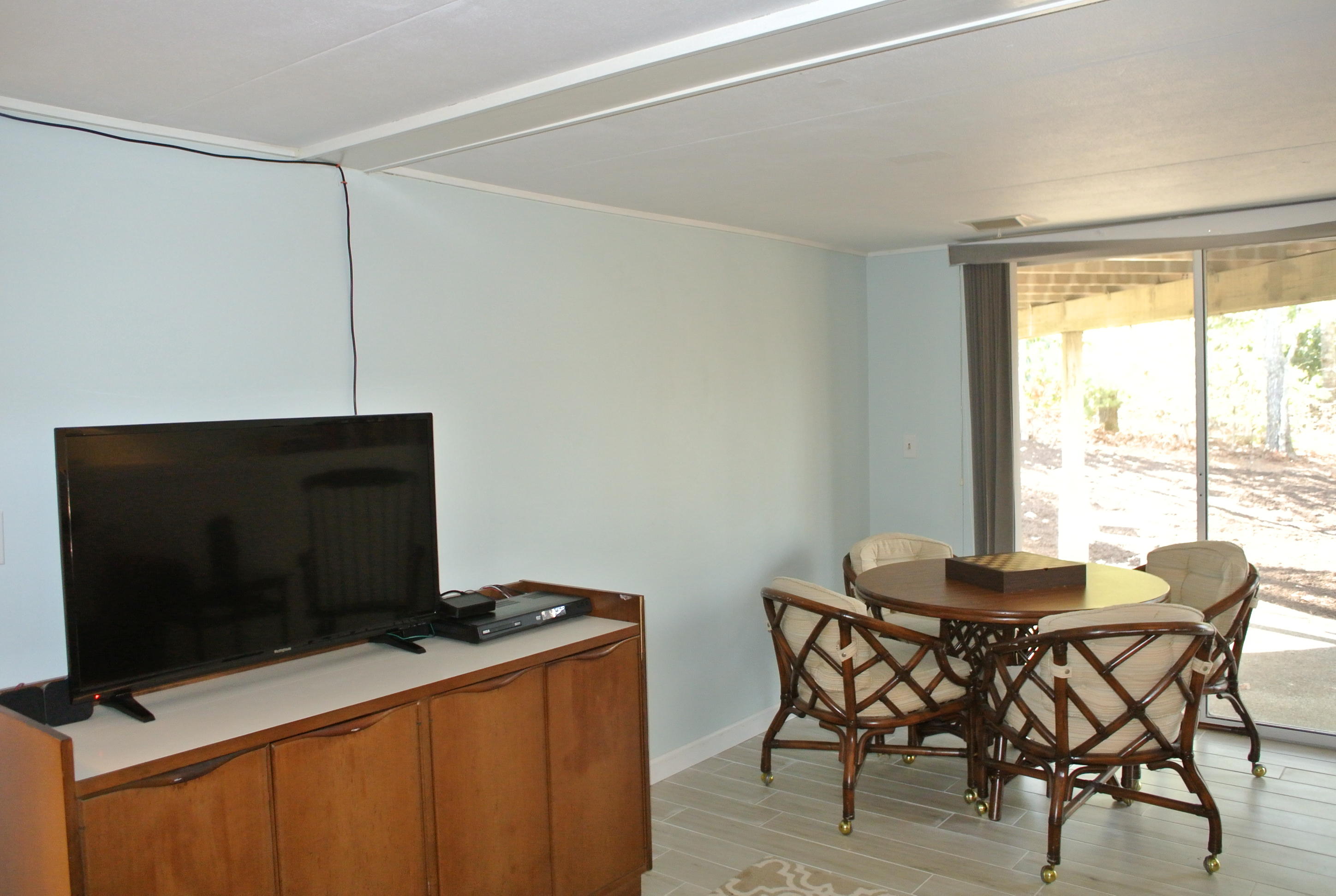 163 Greensward Road Mashpee, MA 02649 - Photo 22 of 37 a dining room with furniture and window