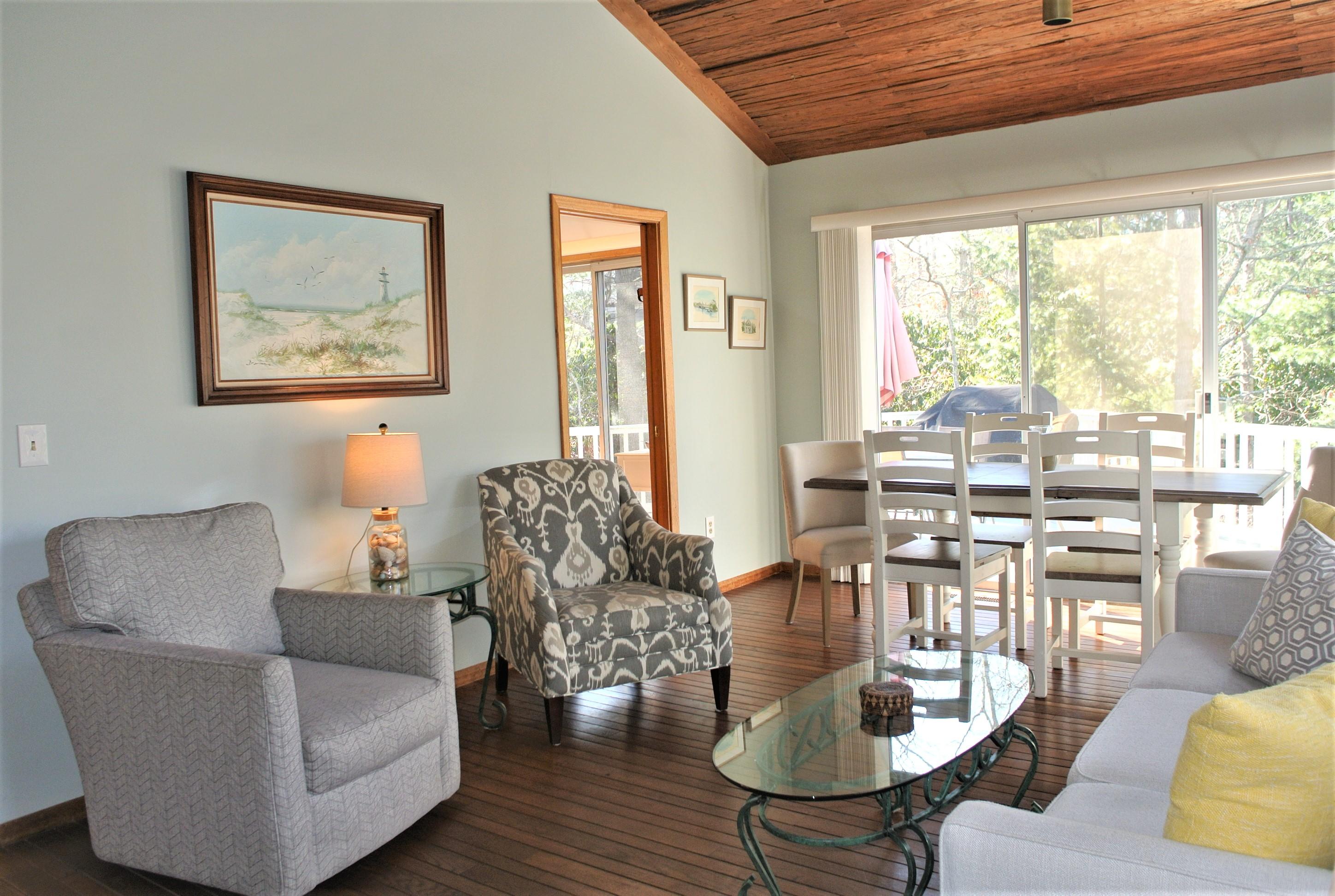 163 Greensward Road Mashpee, MA 02649 - Photo 10 of 37 a living room with furniture and a large window