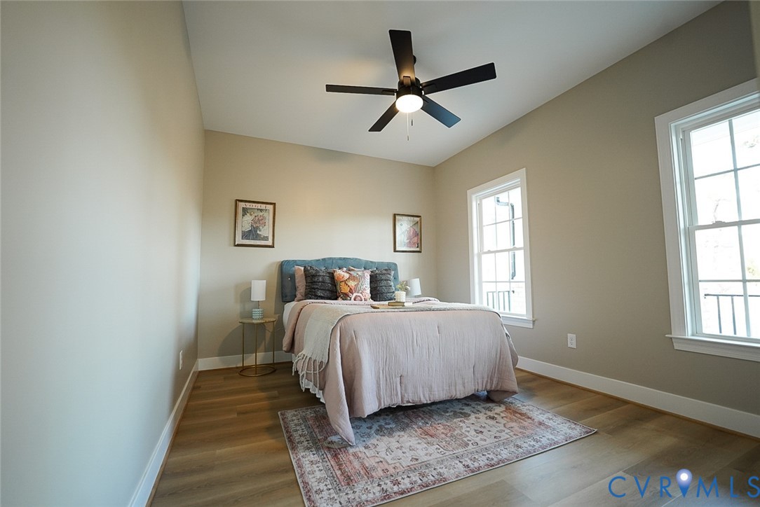 2328 Pocoshock Boulevard North Chesterfield, VA 23235 - Photo 11 of 29 a bed room with a bed and a window