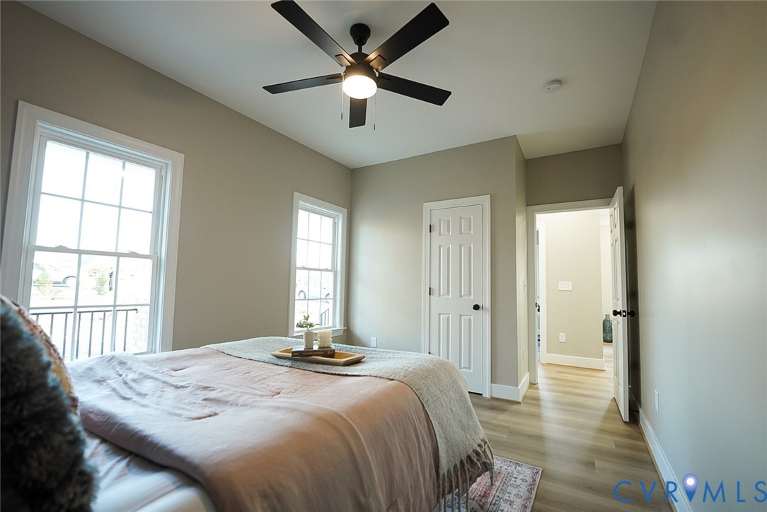 2328 Pocoshock Boulevard North Chesterfield, VA 23235 - Photo 12 of 29 a bedroom with a bed and a window