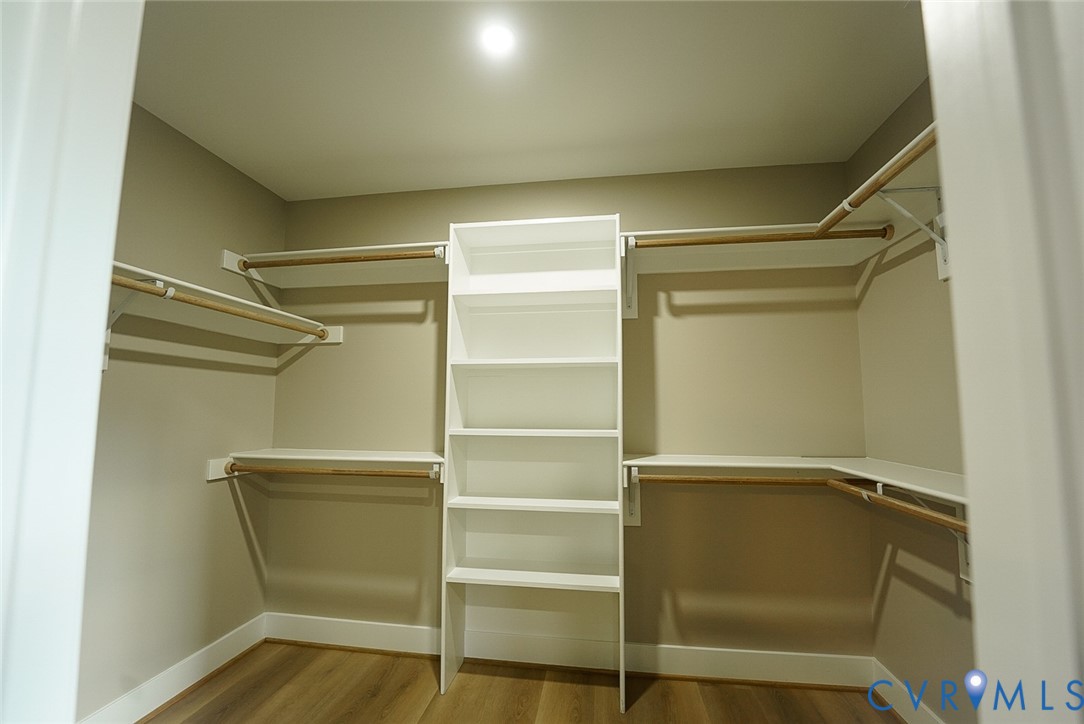 2328 Pocoshock Boulevard North Chesterfield, VA 23235 - Photo 24 of 29 a view of walk in closet with empty racks
