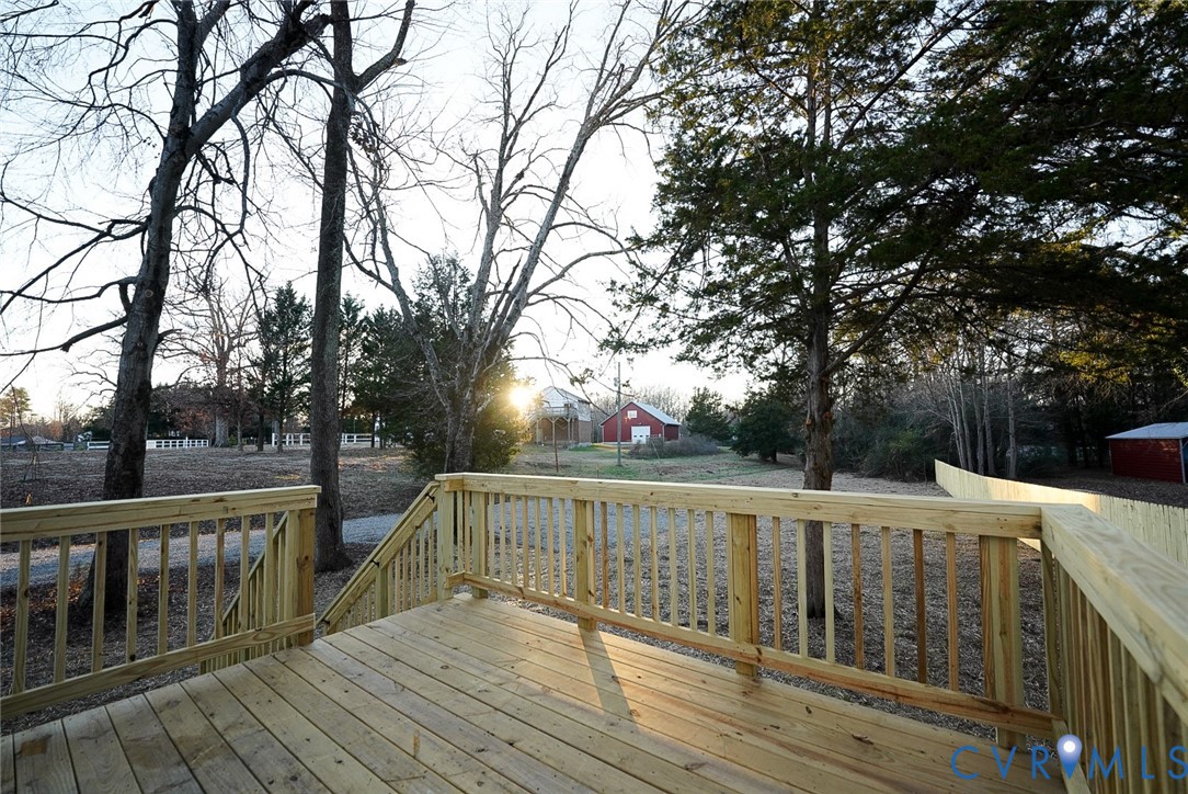 2328 Pocoshock Boulevard North Chesterfield, VA 23235 - Photo 26 of 29 a view of deck with trees and barbeque oven