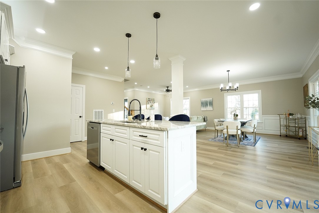 2328 Pocoshock Boulevard North Chesterfield, VA 23235 - Photo 7 of 29 a large white kitchen with lots of counter space