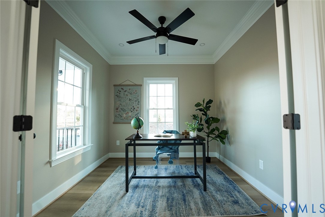2328 Pocoshock Boulevard North Chesterfield, VA 23235 - Photo 10 of 29 a workspace with wooden floor and a window