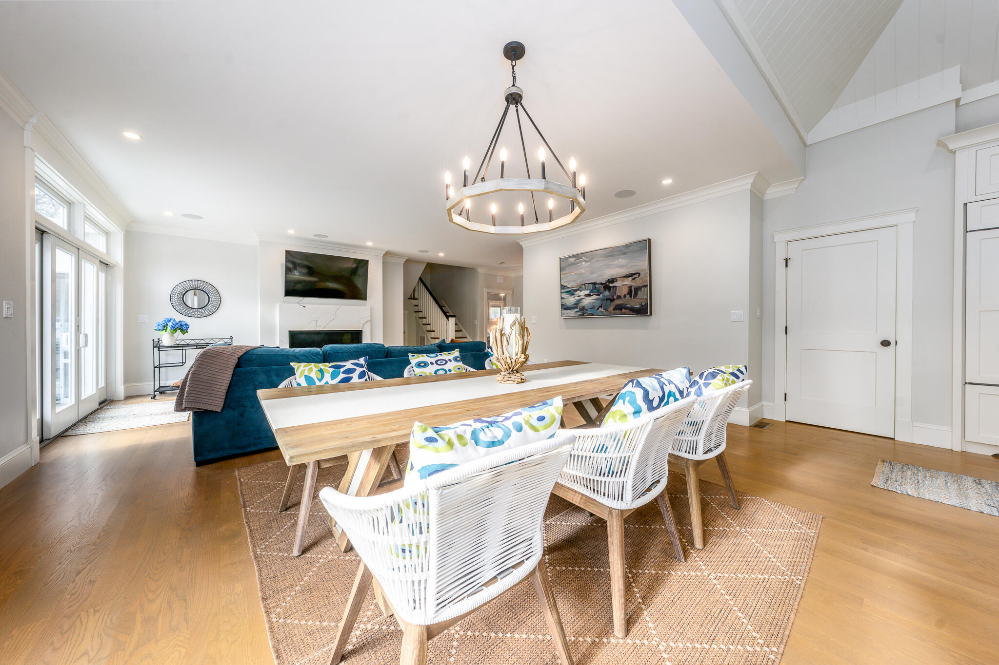 67 Fire Station Road Osterville, MA 02655 - Photo 15 of 53 a dining room with furniture a chandelier and wooden floor