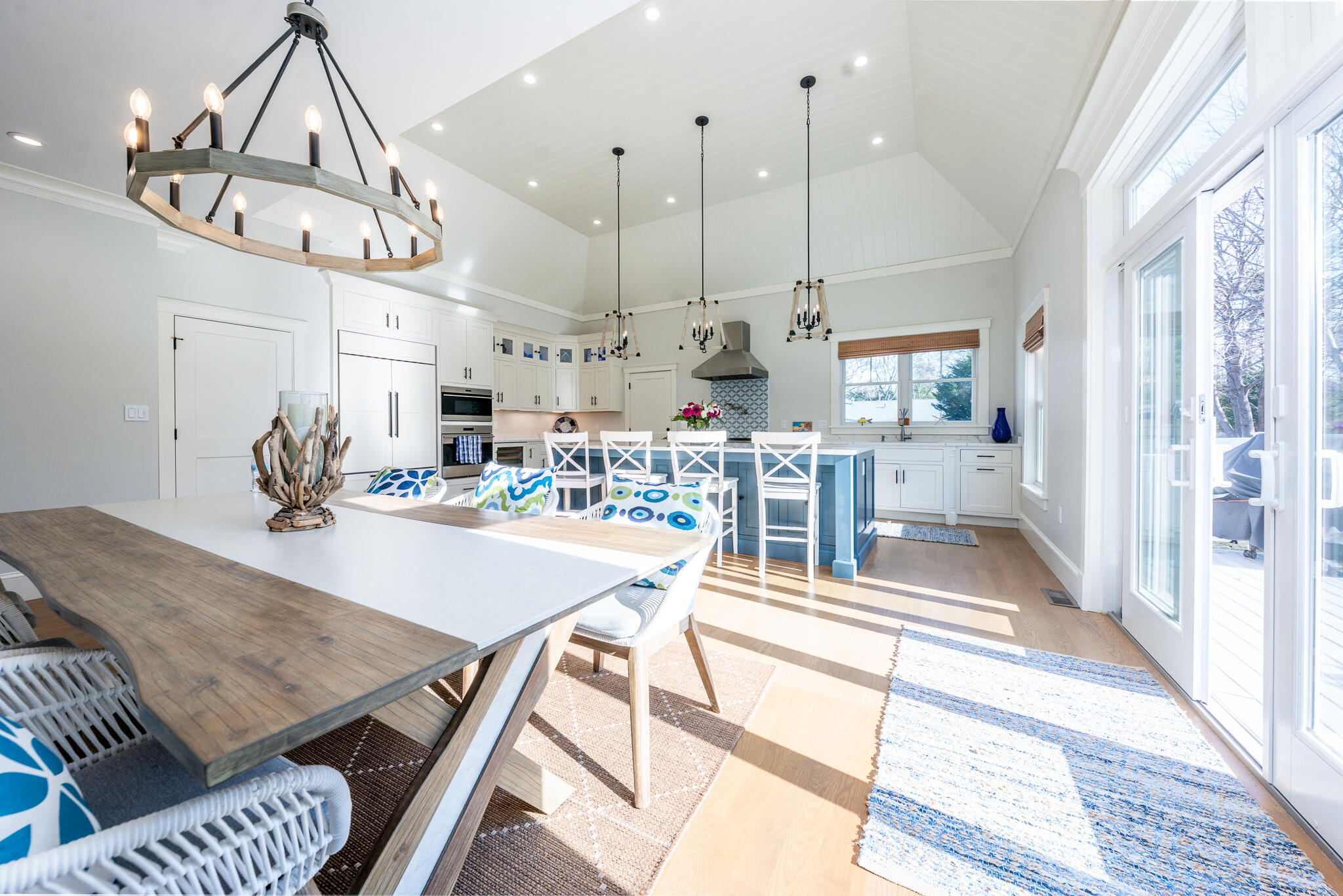 67 Fire Station Road Osterville, MA 02655 - Photo 17 of 53 a view of a dining room with furniture a chandelier and wooden floor
