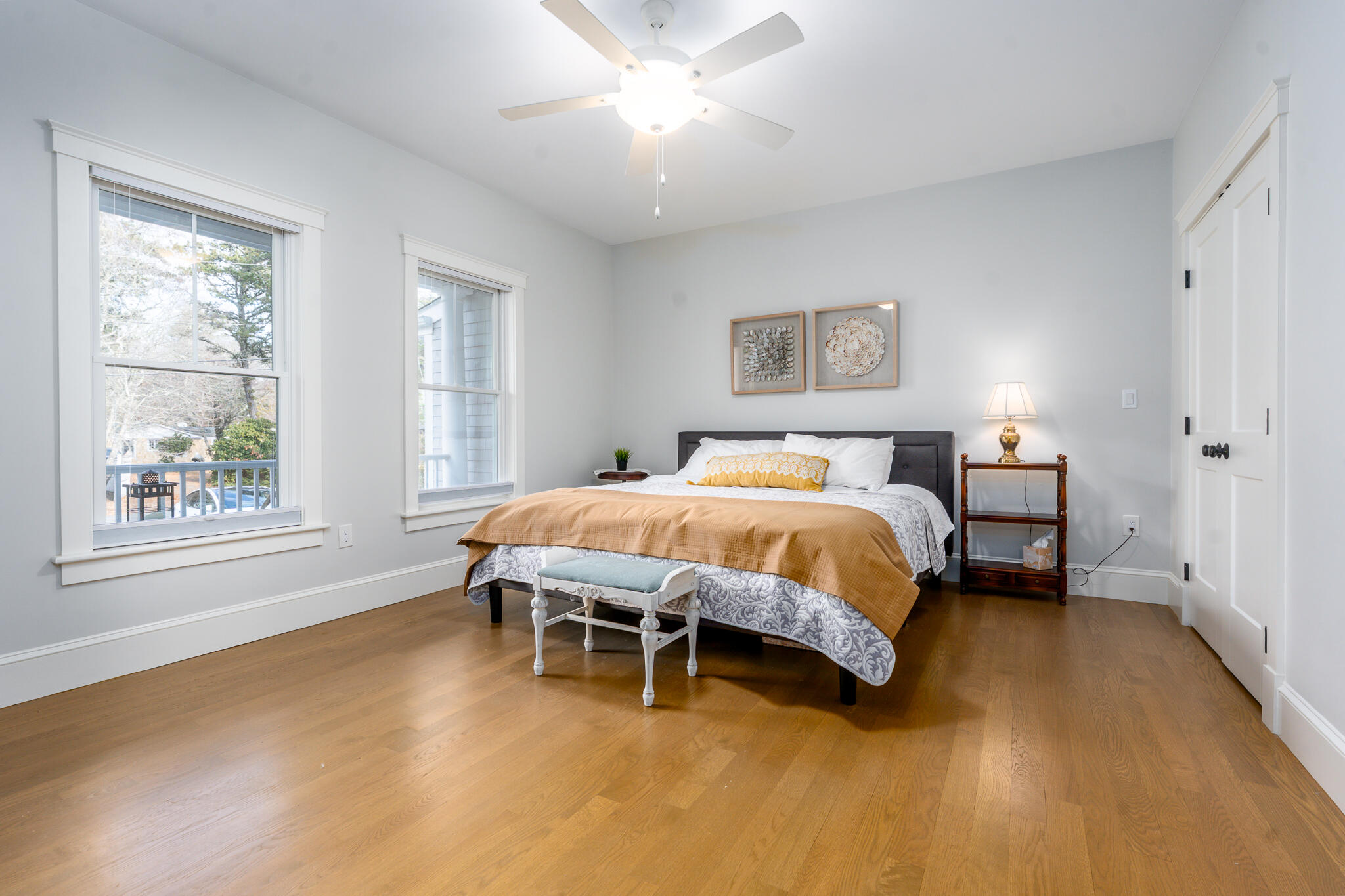 67 Fire Station Road Osterville, MA 02655 - Photo 22 of 53 a bedroom with a bed and wooden floor