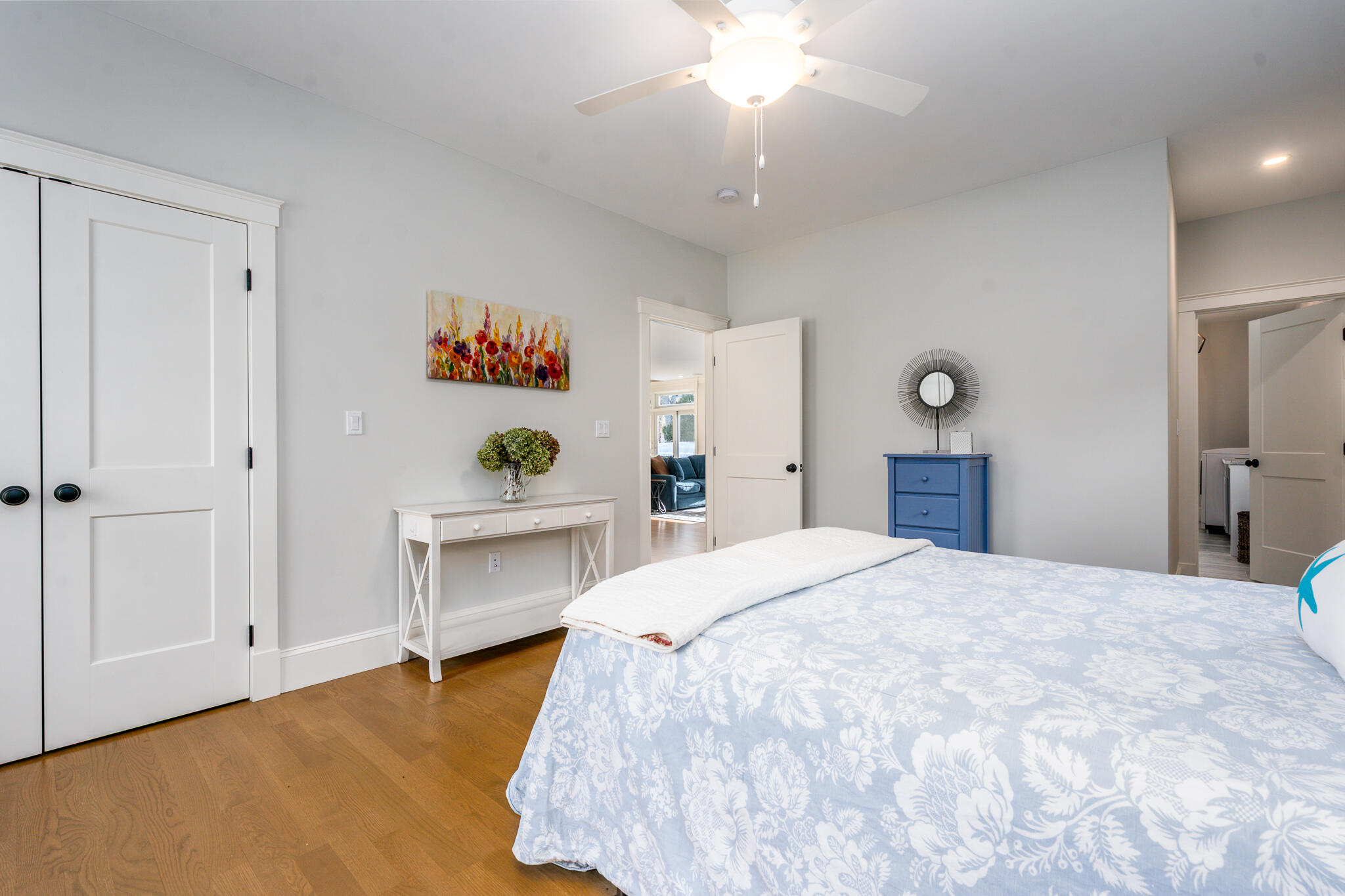 67 Fire Station Road Osterville, MA 02655 - Photo 26 of 53 a bedroom with a bed and a chandelier
