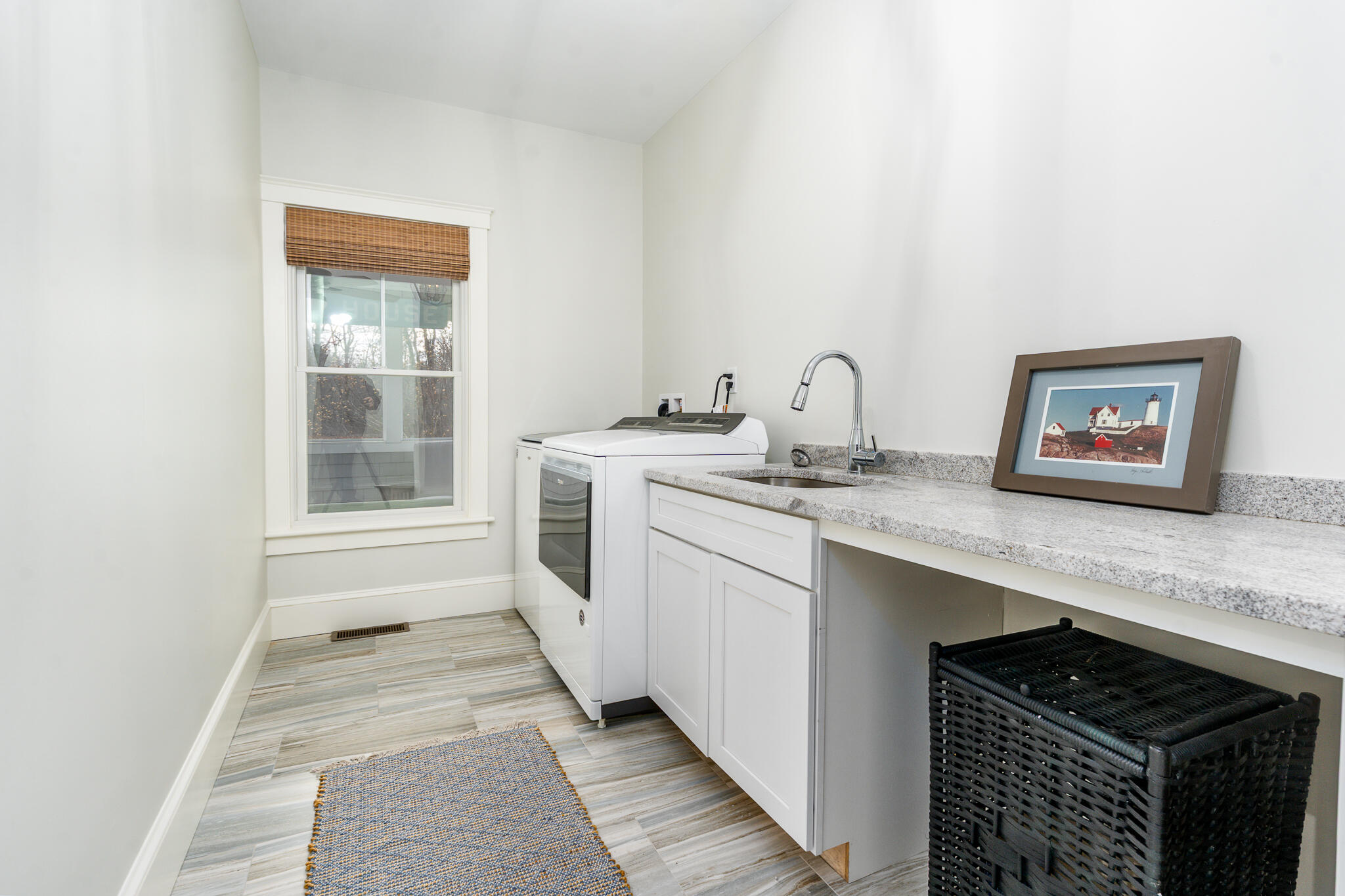 67 Fire Station Road Osterville, MA 02655 - Photo 28 of 53 a kitchen with a sink stove and cabinets