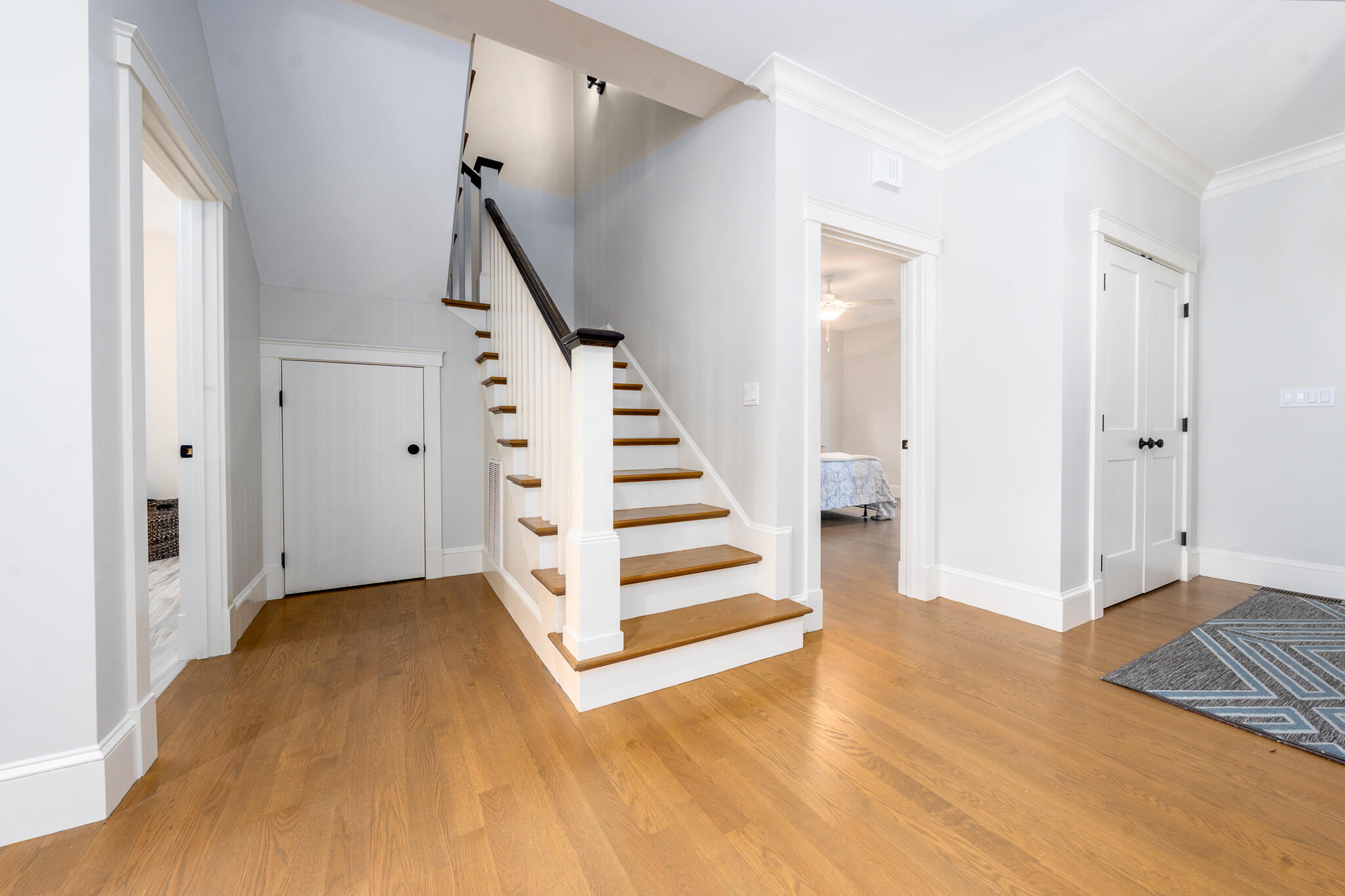 67 Fire Station Road Osterville, MA 02655 - Photo 29 of 53 a view of a room with wooden floor and stairs
