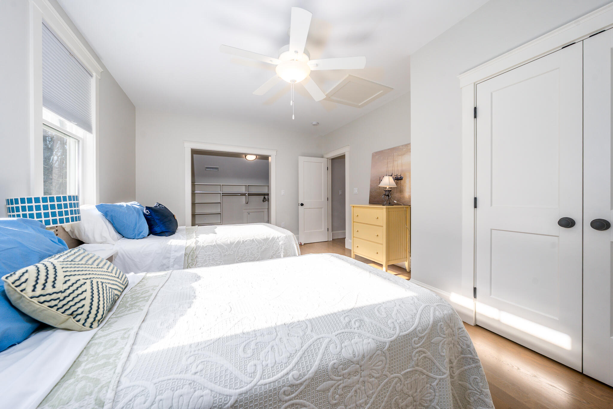 67 Fire Station Road Osterville, MA 02655 - Photo 34 of 53 a bedroom with a large bed and a chandelier