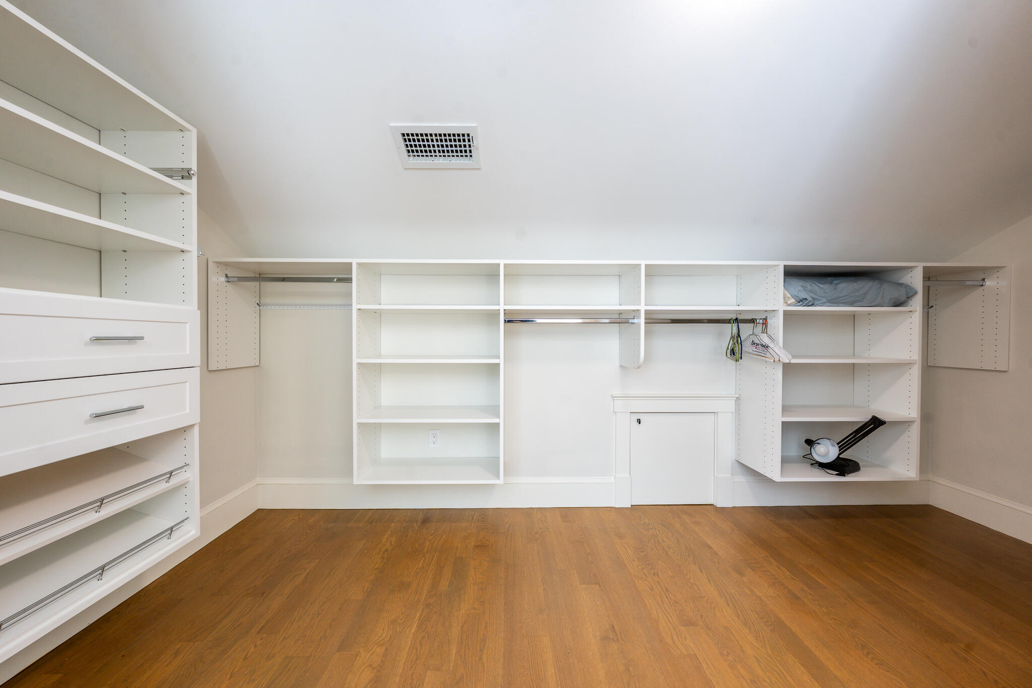 67 Fire Station Road Osterville, MA 02655 - Photo 35 of 53 a view of a room with storage and racks on wall