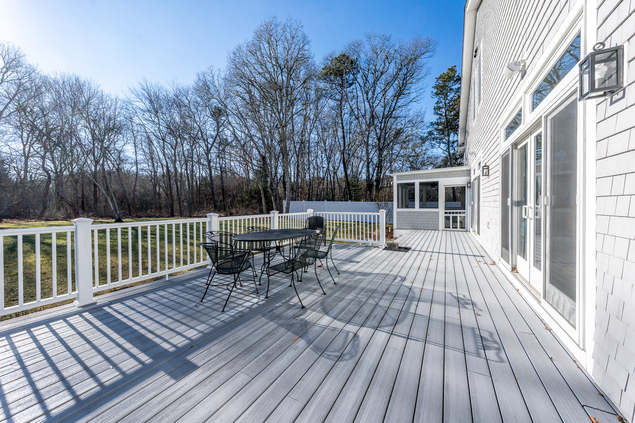 67 Fire Station Road Osterville, MA 02655 - Photo 41 of 53 a view of a chairs on wooden deck