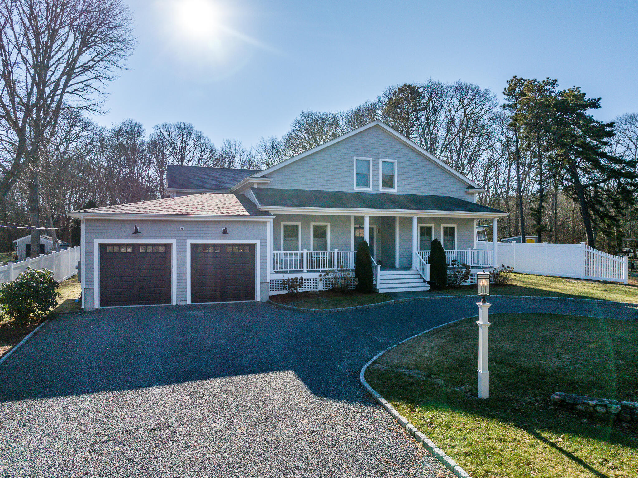 67 Fire Station Road Osterville, MA 02655 - Photo 49 of 53 a front view of a house with garden