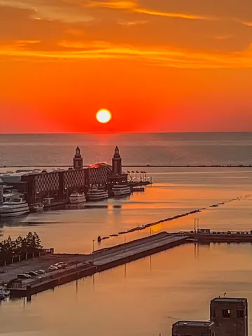 a kitchen with cabinets appliances and a center island