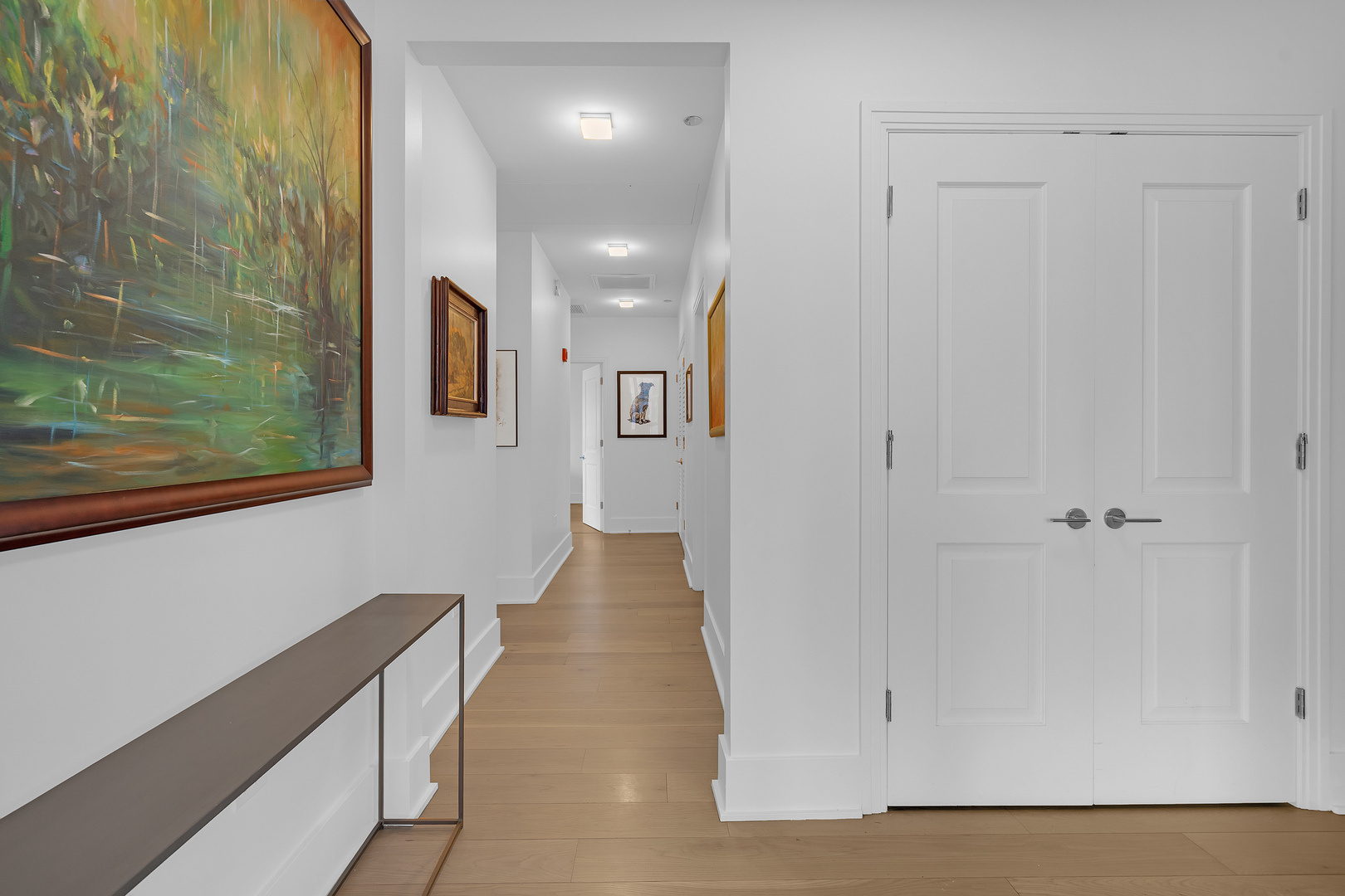 363 East Wacker Drive, Unit 1402 Chicago, IL 60601 - Photo 29 of 75 a view of a hallway with wooden floor and staircase