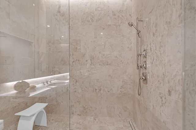 a view of living room with furniture and floor to ceiling window