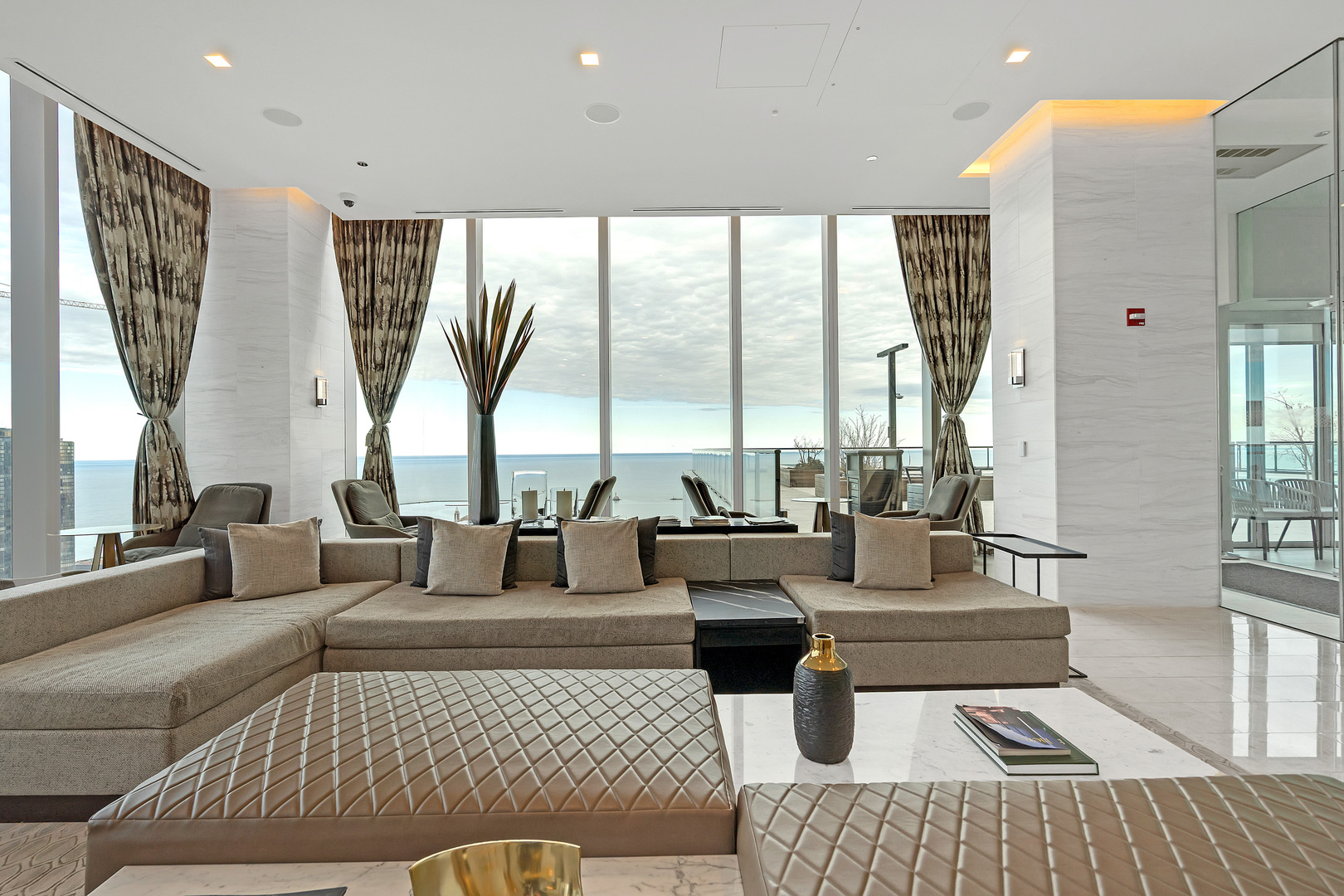 363 East Wacker Drive, Unit 1402 Chicago, IL 60601 - Photo 58 of 75 a living room with furniture and a large window