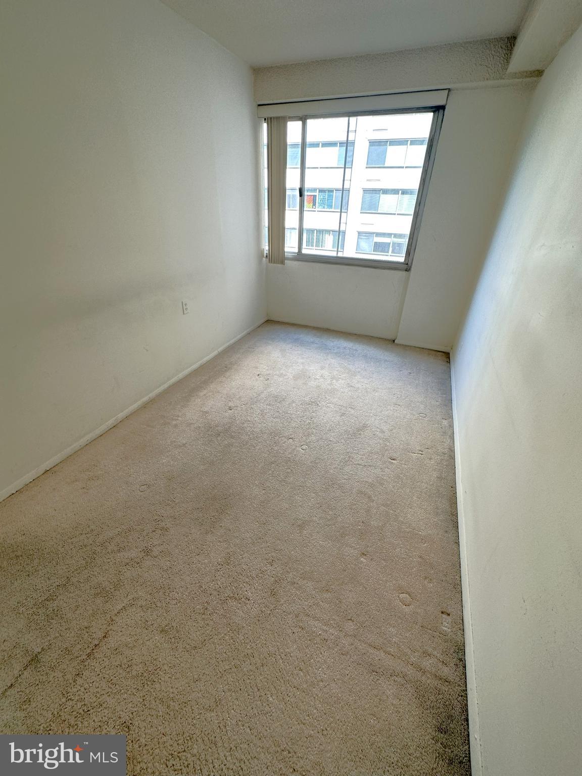 5500 Friendship Boulevard, Unit 1125N Chevy Chase, MD 20815 - Photo 12 of 48 an empty room with a window