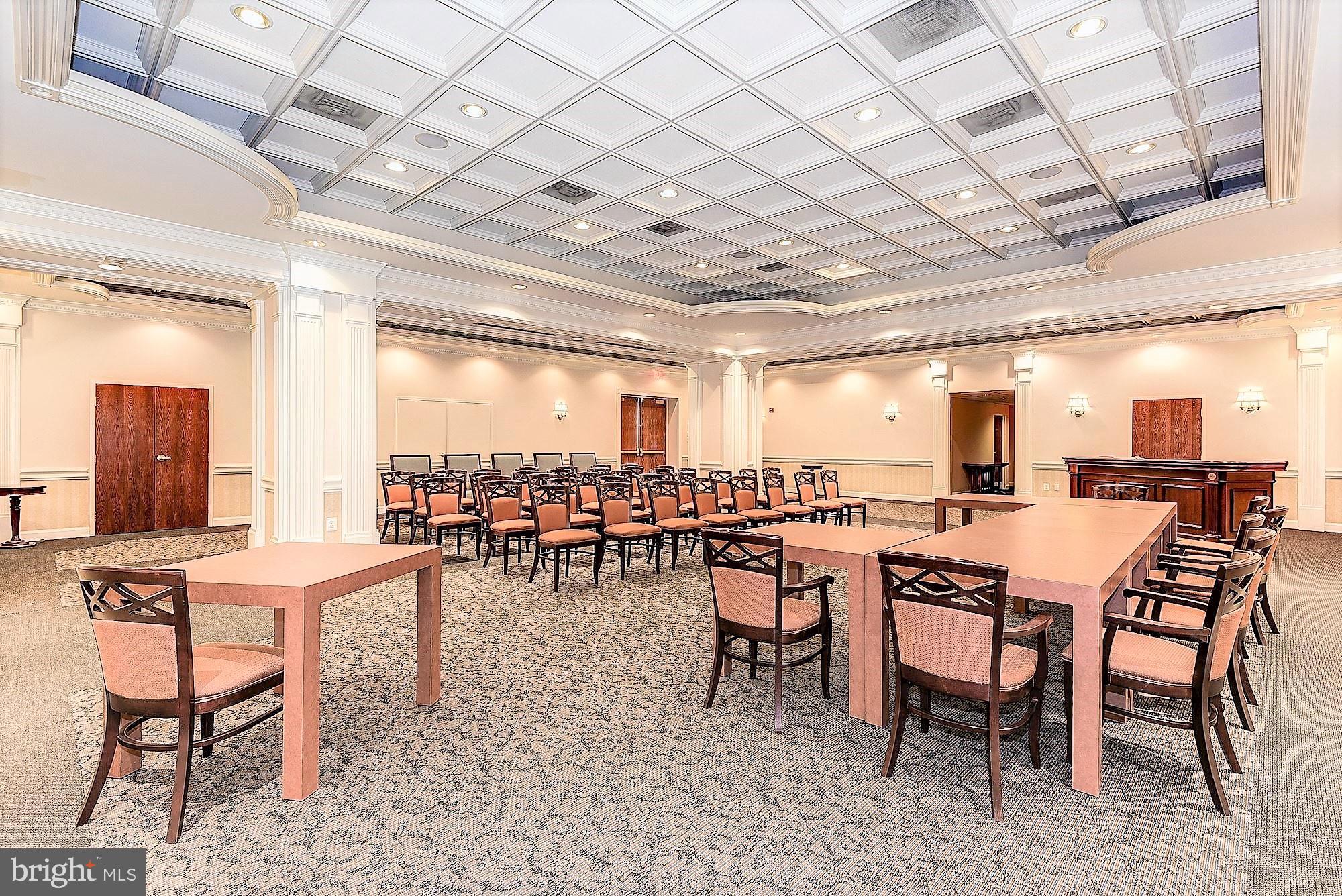5500 Friendship Boulevard, Unit 1125N Chevy Chase, MD 20815 - Photo 27 of 48 a outdoor space with lots of chairs a large window and a table