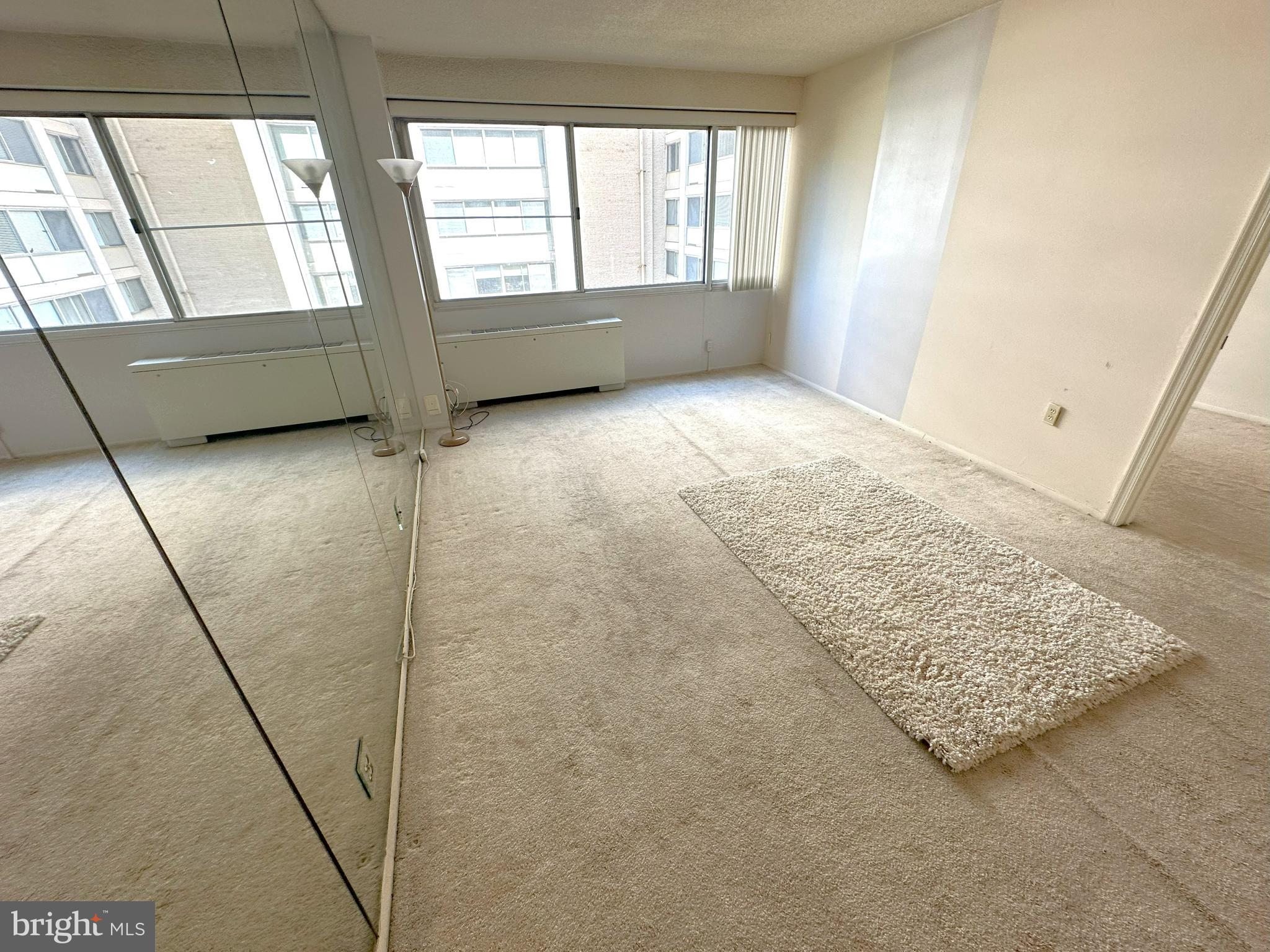 5500 Friendship Boulevard, Unit 1125N Chevy Chase, MD 20815 - Photo 5 of 48 a view of an empty room and window