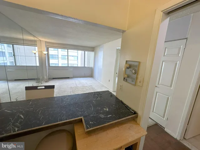 a view of a kitchen with an entryway