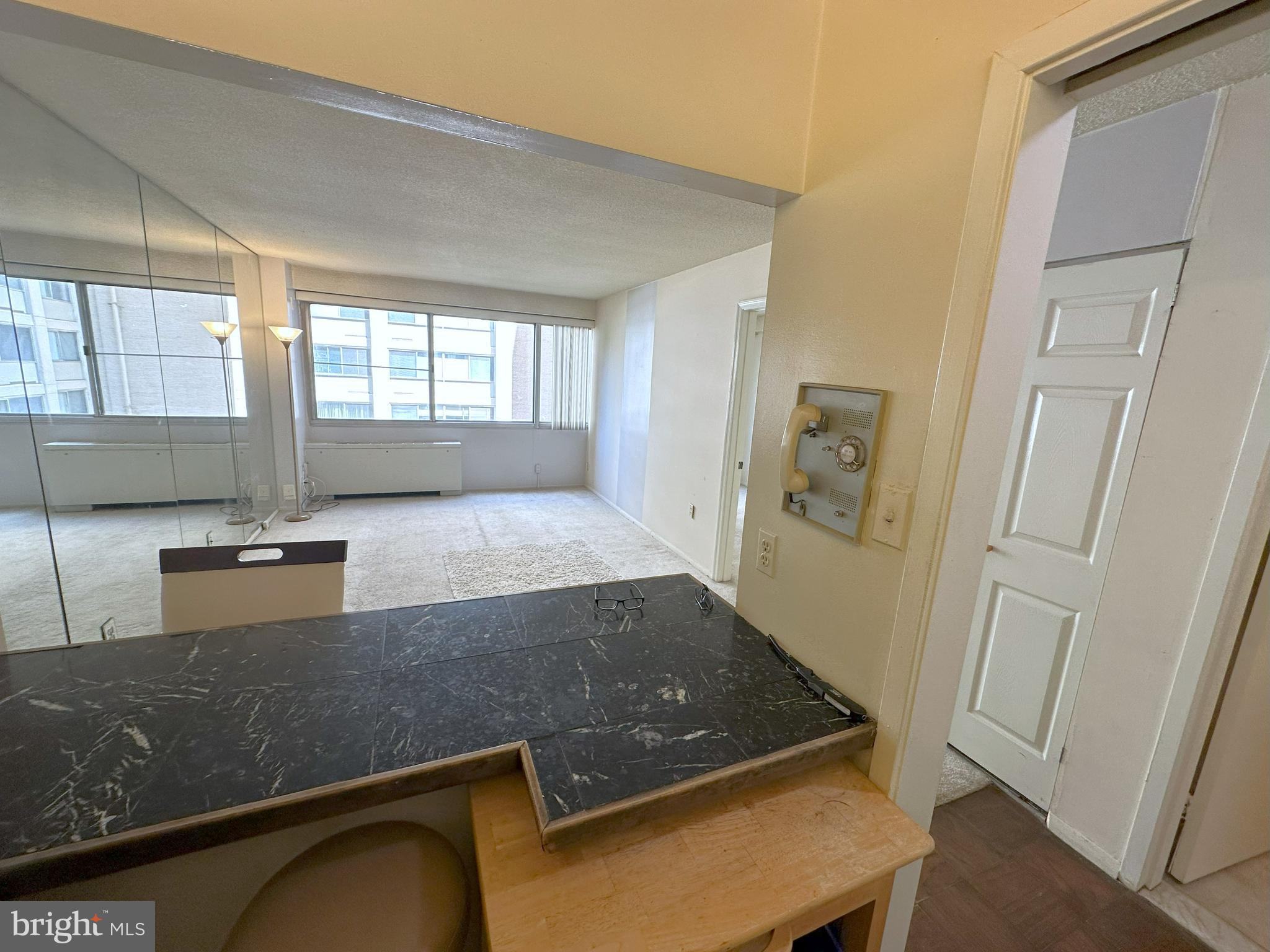 5500 Friendship Boulevard, Unit 1125N Chevy Chase, MD 20815 - Photo 8 of 48 a view of a kitchen with an entryway