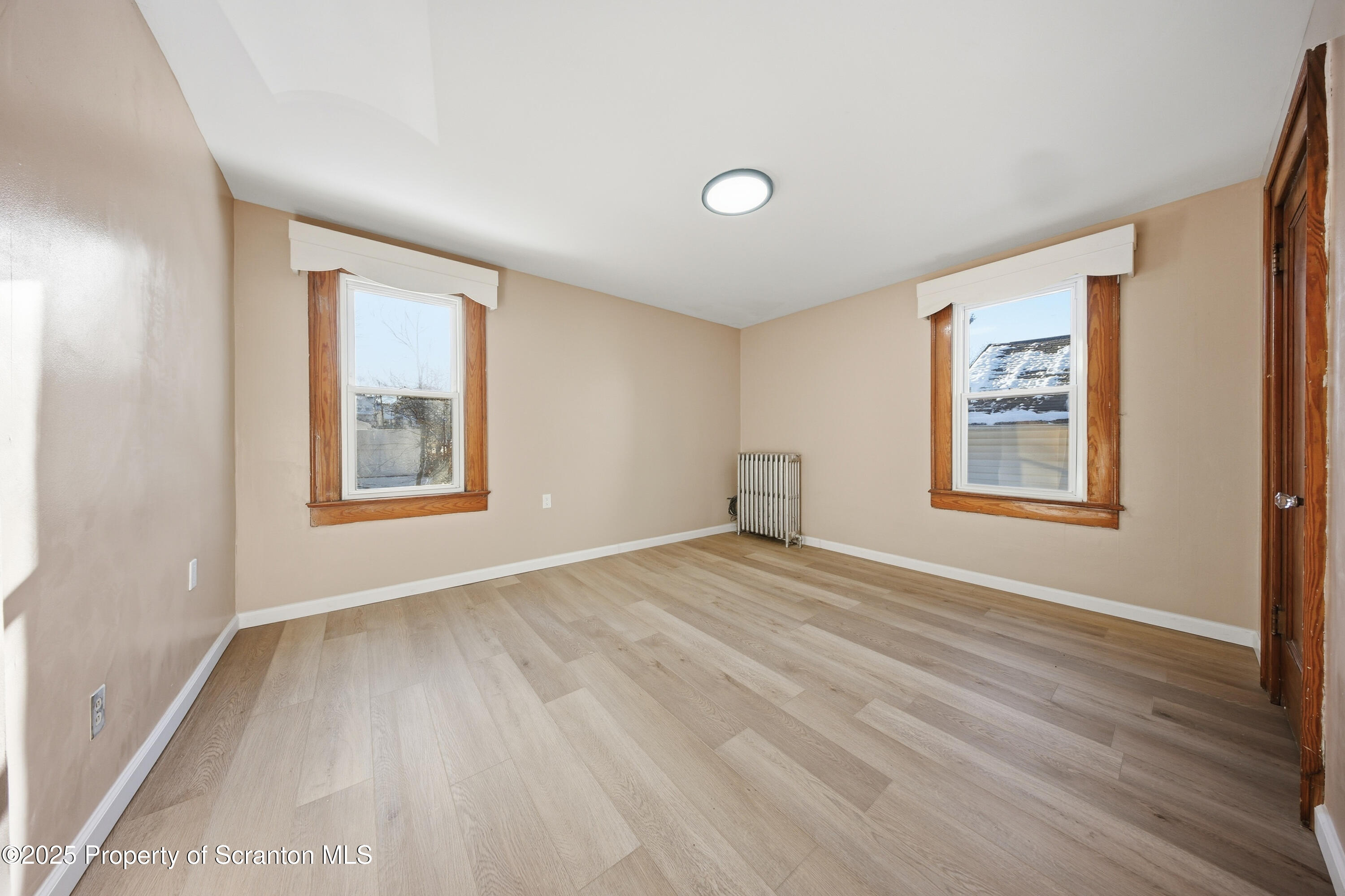 1312-14 North Washington Avenue Scranton, PA 18509 - Photo 12 of 22 a view of an empty room with windows