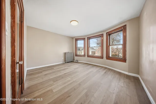 an empty room with a window