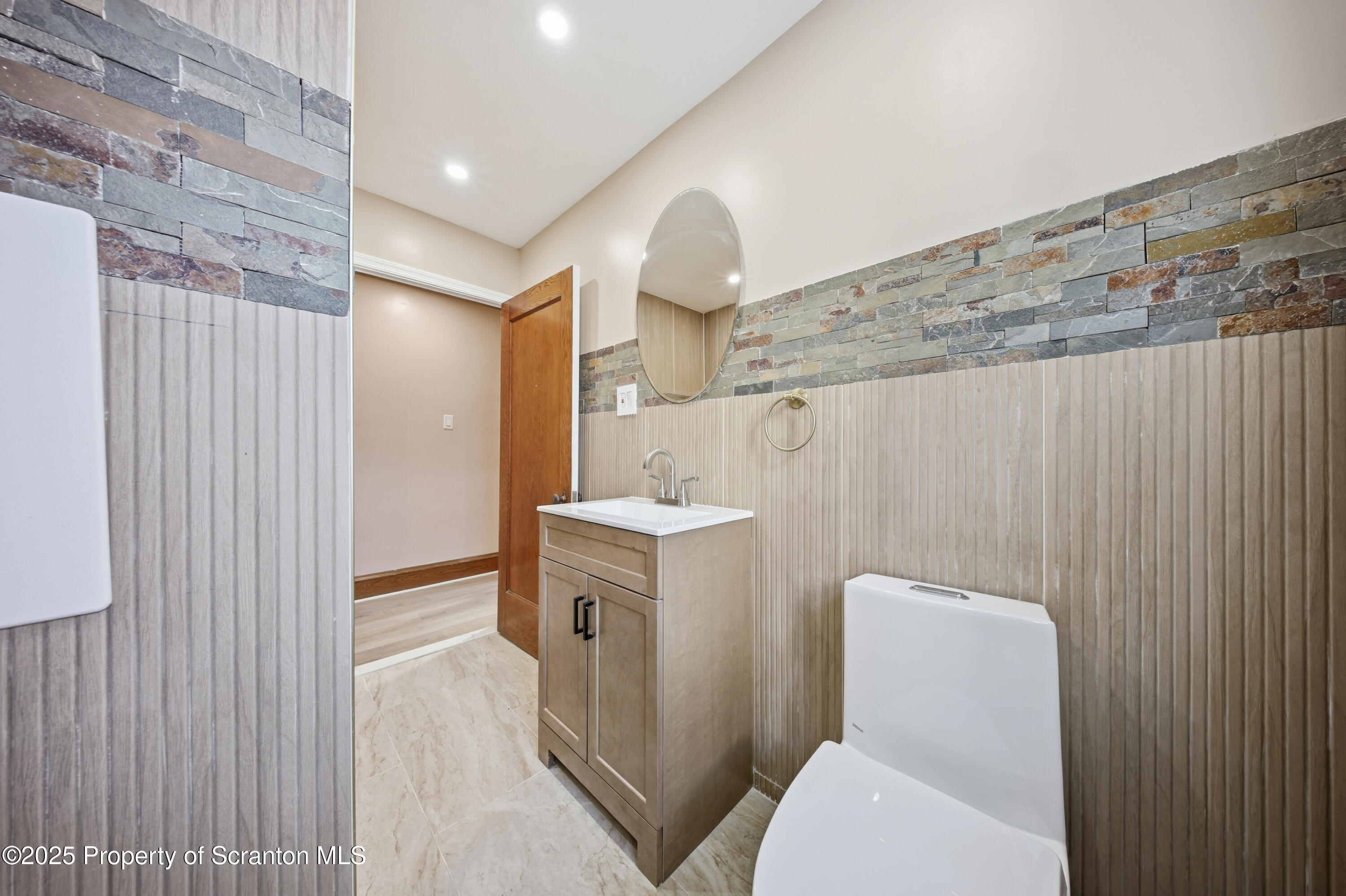 1312-14 North Washington Avenue Scranton, PA 18509 - Photo 17 of 22 a bathroom with a sink toilet and shower