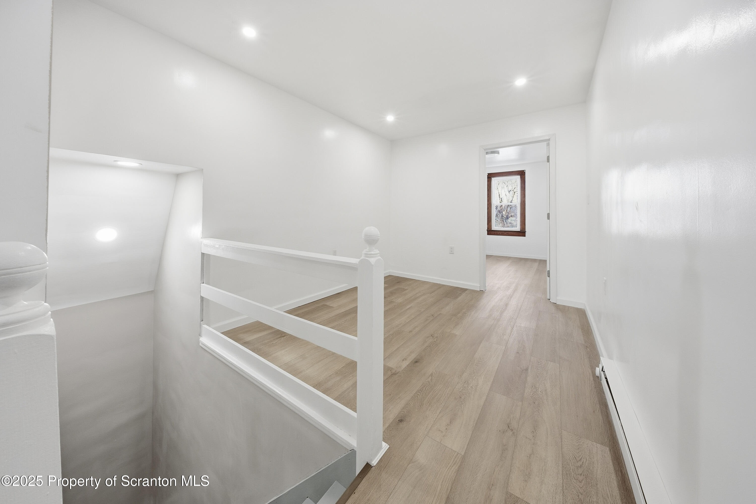 1312-14 North Washington Avenue Scranton, PA 18509 - Photo 18 of 22 a view of entryway with wooden floor