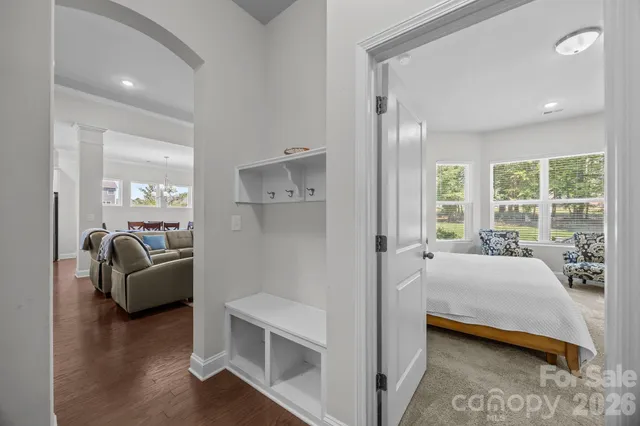 a bathroom with a toilet and a bath tub
