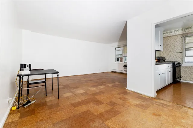 a view of a workspace with furniture