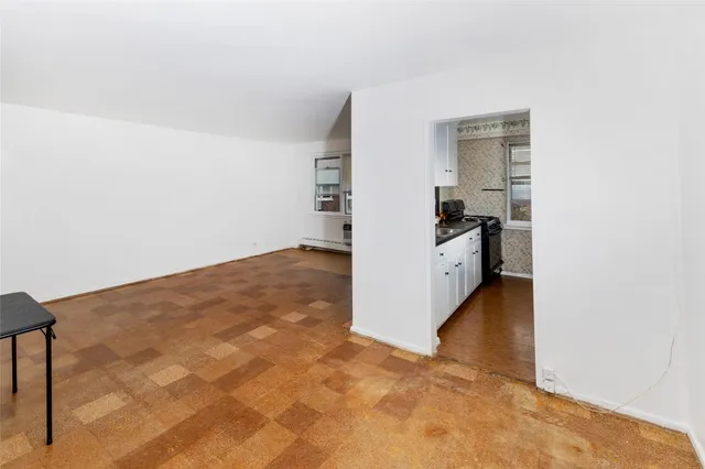 a view of a kitchen with a sink