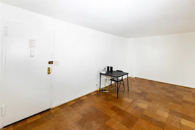 a view of a room with table and chair