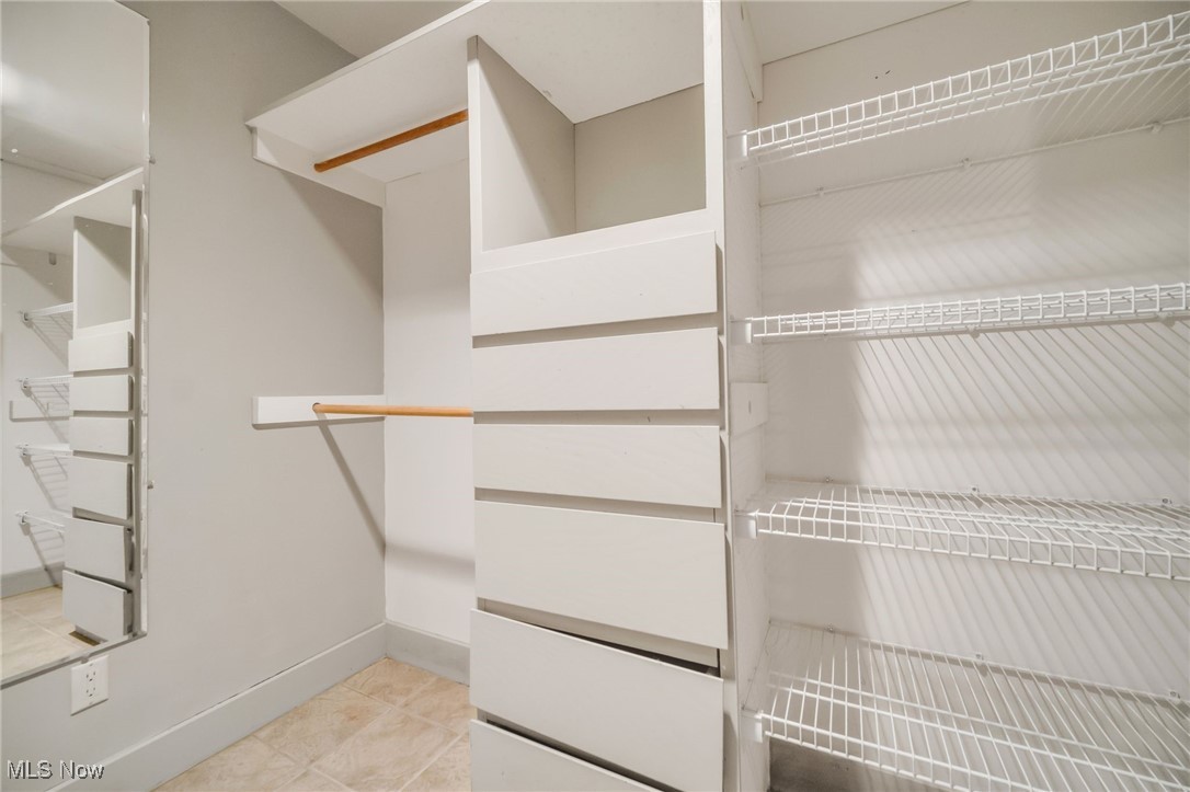 18060 Falling Leaves Road Strongsville, OH 44136 - Photo 20 of 43 Spacious closet with tile patterned floors