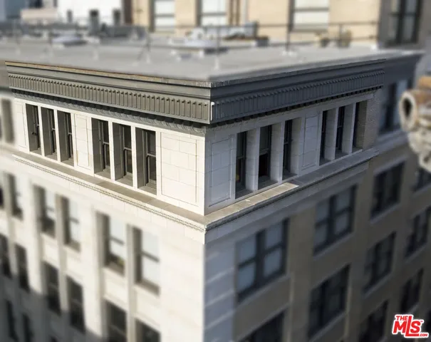 a picture of a book and a white wall