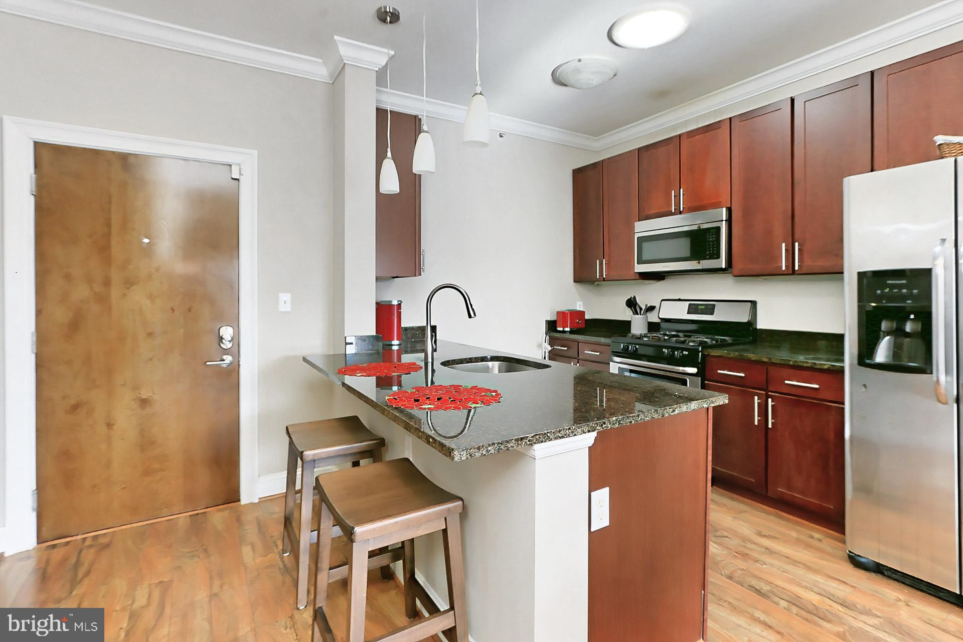 6301 Edsall Road, Unit 605 Alexandria, VA 22312 - Photo 9 of 36 Great kitchen with bar sitting area
