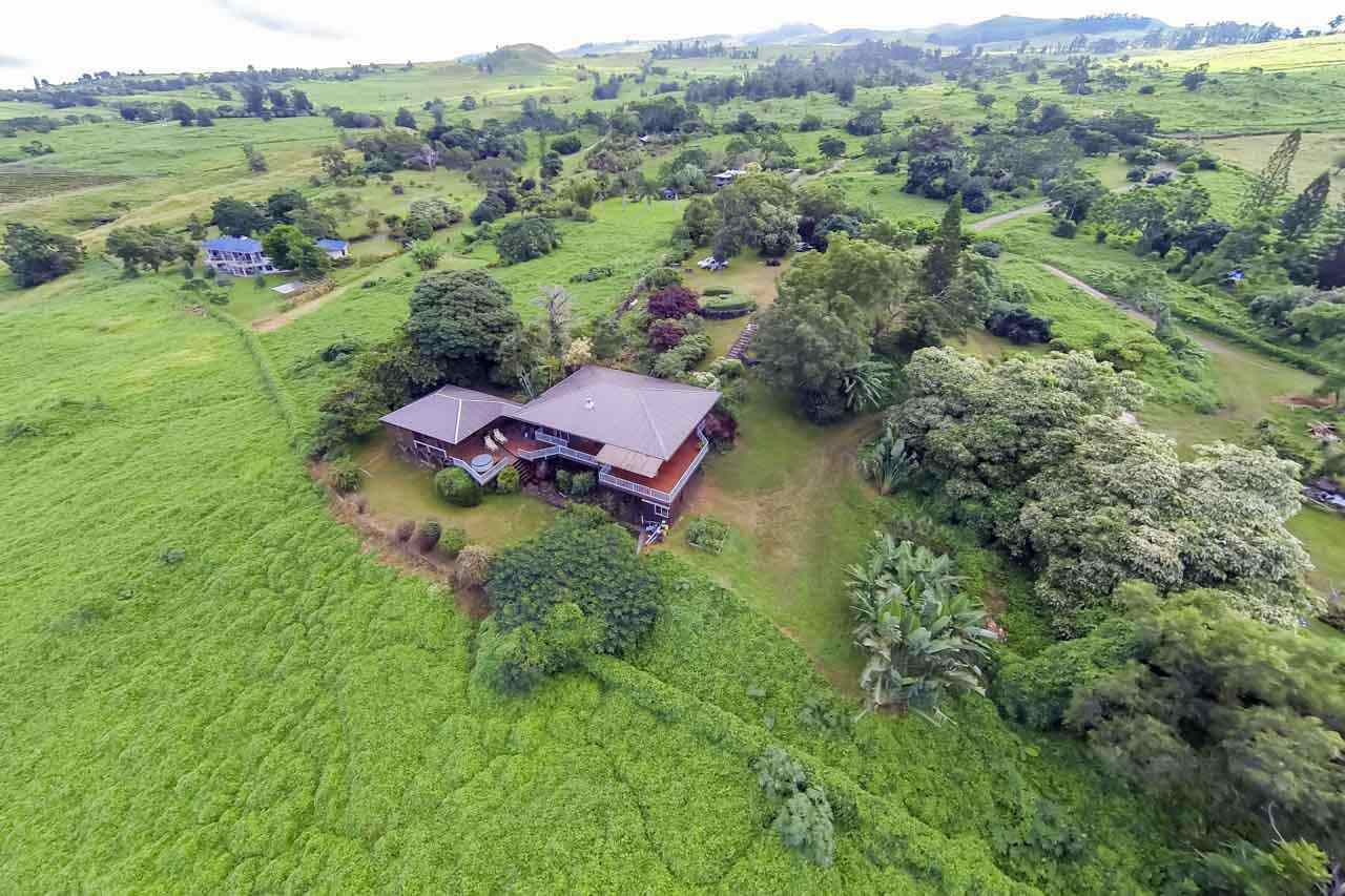 13434 Kula Highway Kula, HI 96790 - Photo 1 of 30 an aerial view of a house with a yard