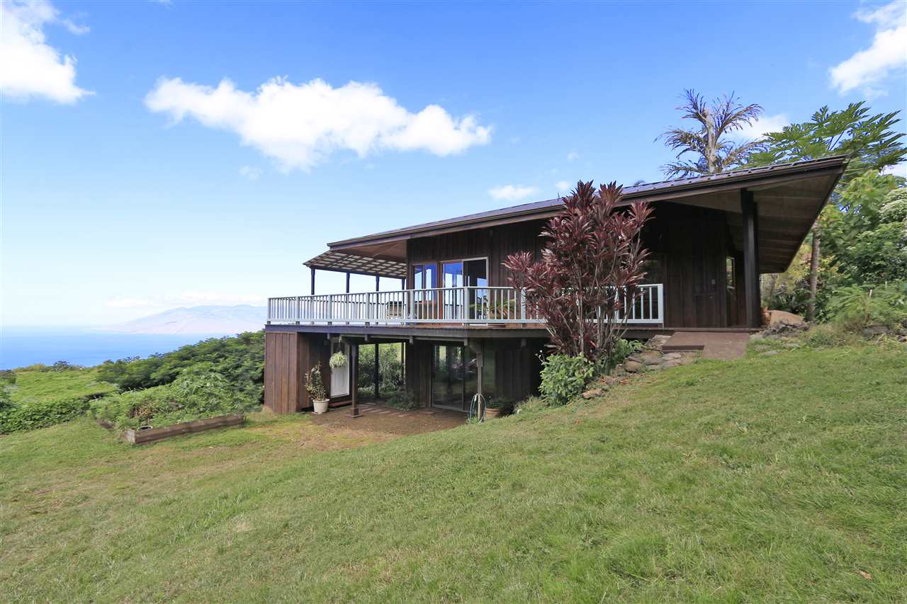 13434 Kula Highway Kula, HI 96790 - Photo 17 of 30 front view of a house with a yard