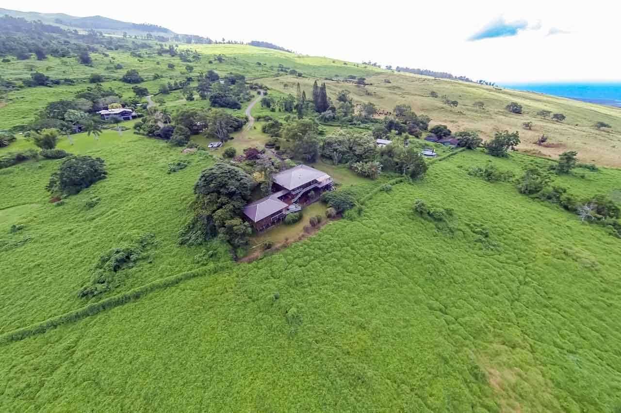 13434 Kula Highway Kula, HI 96790 - Photo 22 of 30 a view of a lush green hillside and houses