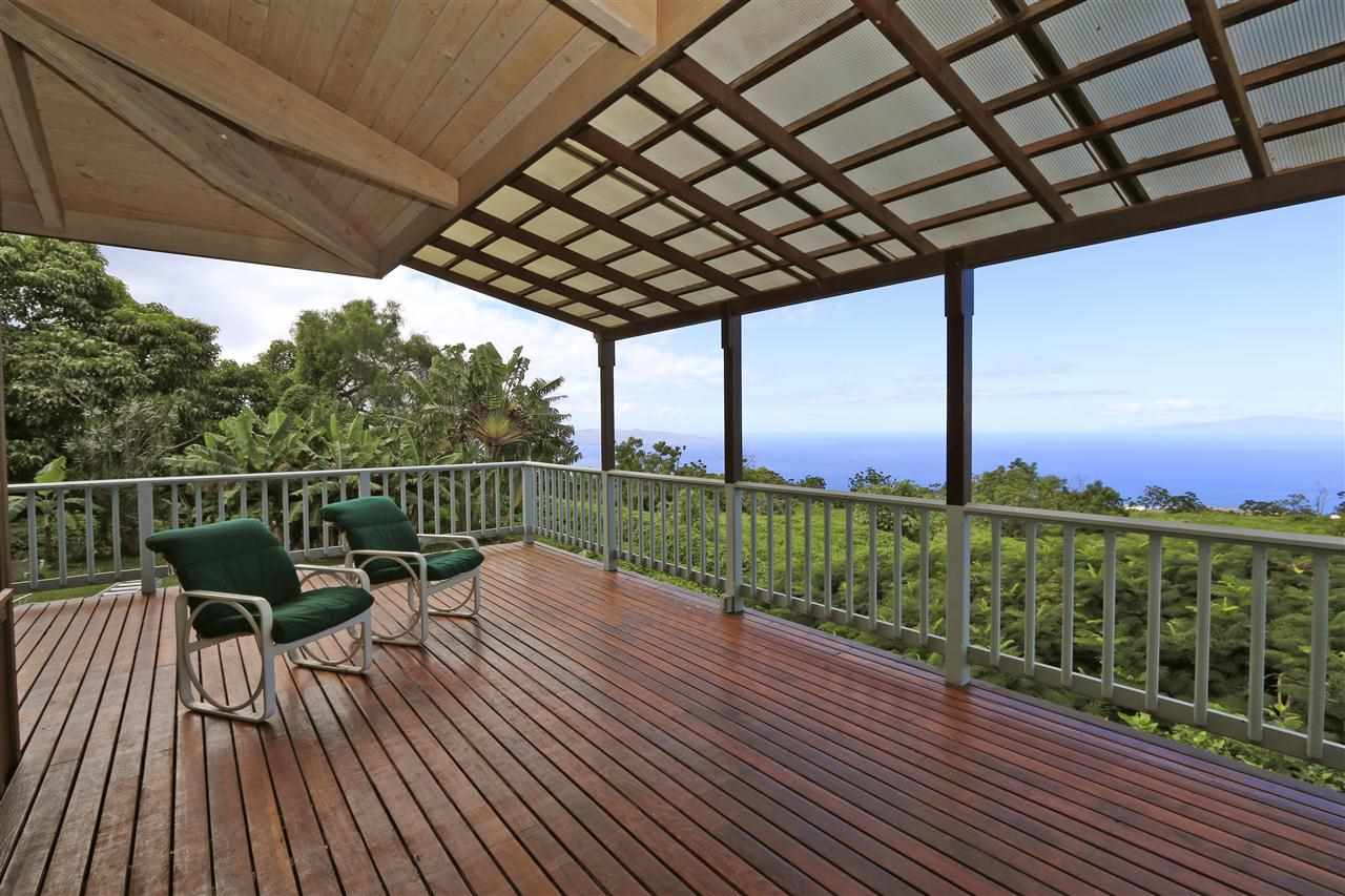 13434 Kula Highway Kula, HI 96790 - Photo 5 of 30 a view of balcony with wooden floor and fence