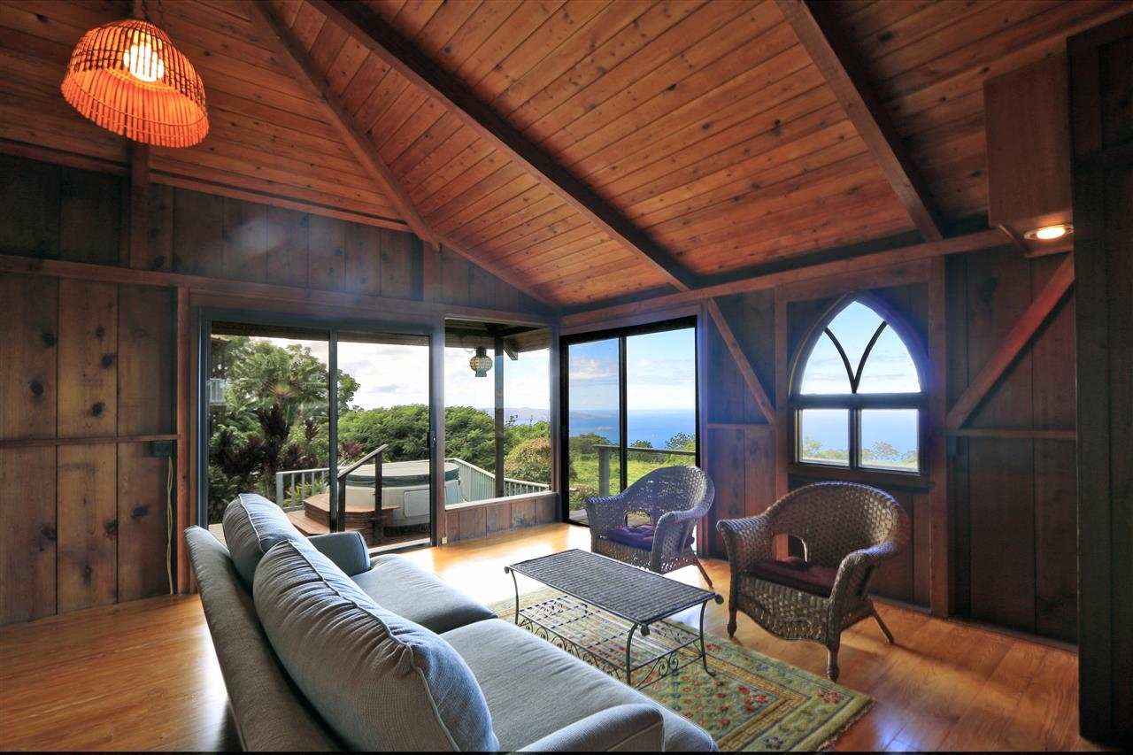 13434 Kula Highway Kula, HI 96790 - Photo 7 of 30 a living room with furniture and a large window